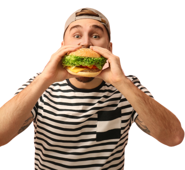 young man in a stripe t shirt eating delicious burger